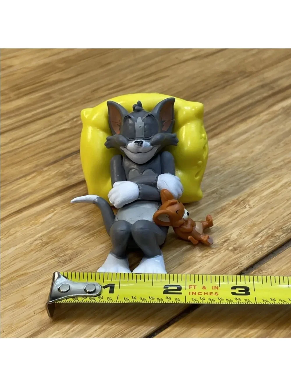 Warner Bros. Gray Tom & Brown Jerry with Yellow Cheese Bed Figurine
